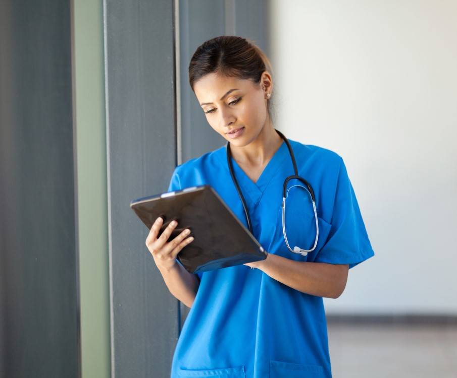 nurse with tablet